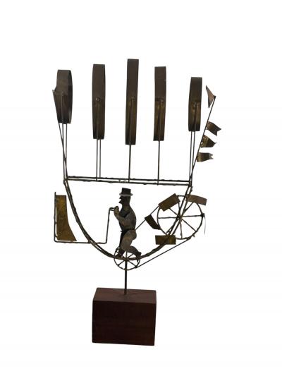 Curtis Jer BRUTALIST MAN DRIVING FLYING MACHINE SCULPTURE BY CURTIS JERE
