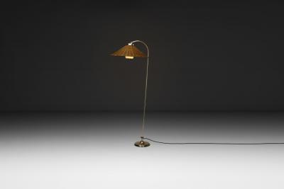 Curved Floor Lamp with Brass Stem and Rattan Shade Europe Mid 20th Century