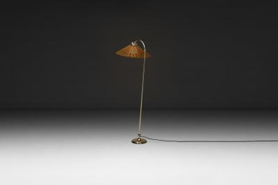 Curved Floor Lamp with Brass Stem and Rattan Shade Europe Mid 20th Century