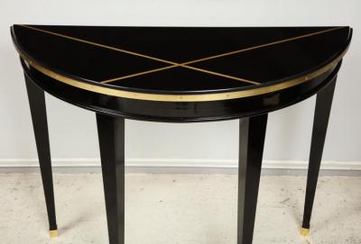 Custom Pair of Ebonized Demilune Consoles with Inlaid Brass Top