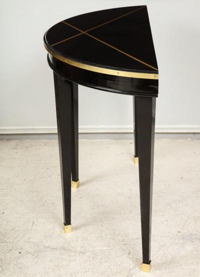 Custom Pair of Ebonized Demilune Consoles with Inlaid Brass Top