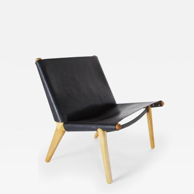 DEREK MCLEOD Leather sling chair