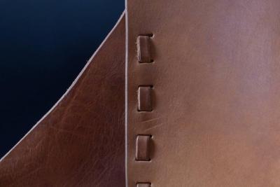 Dan Wenger Enclosed Lotus Lounge Chair by Dan Wenger in Leather and Steel