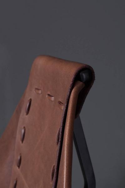 Dan Wenger Enclosed Lotus Lounge Chair by Dan Wenger in Leather and Steel