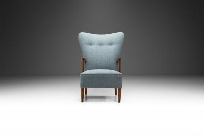 Danish Armchair in Teak with Brass Capped Legs Denmark circa 1950s