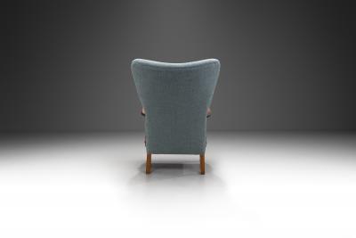 Danish Armchair in Teak with Brass Capped Legs Denmark circa 1950s