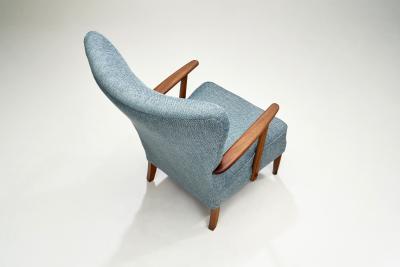 Danish Armchair in Teak with Brass Capped Legs Denmark circa 1950s