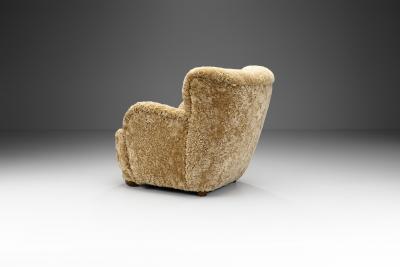 Danish Cabinetmaker Armchair in Warm Sheepskin Denmark ca 1950s