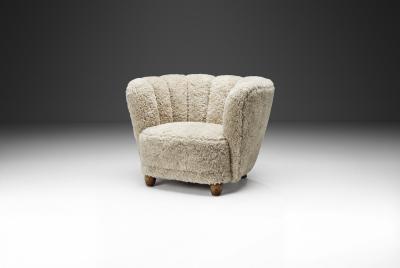 Danish Cabinetmaker Lounge Chair with Sheepskin Upholstery Denmark 1940s