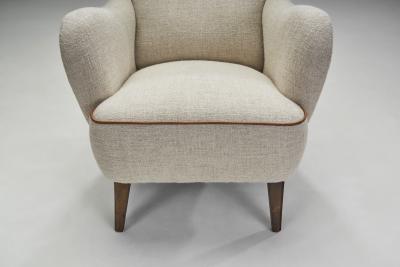 Danish Cabinetmaker Wing Back Chair with Stained Beech Legs Denmark 1940s