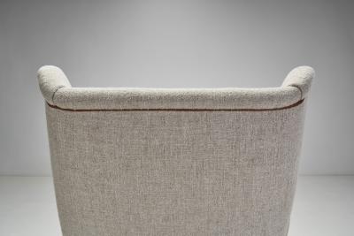 Danish Cabinetmaker Wing Back Chair with Stained Beech Legs Denmark 1940s