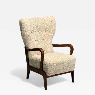 Danish Mid Century Modern Beige Sheepskin Beech Lounge Chair Denmark 1960s