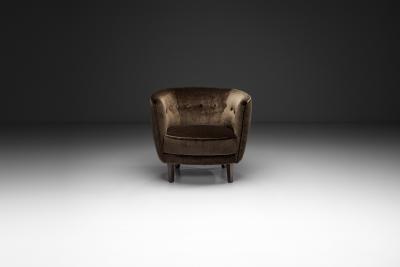 Dark Brown Upholstered Armchair with Stained Beech Legs Denmark ca 1940s