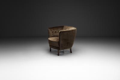 Dark Brown Upholstered Armchair with Stained Beech Legs Denmark ca 1940s