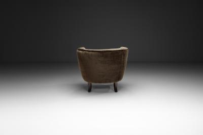 Dark Brown Upholstered Armchair with Stained Beech Legs Denmark ca 1940s