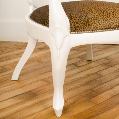 David Barrett A pair of white lacquered armchairs designed by D Barrett circa 1970