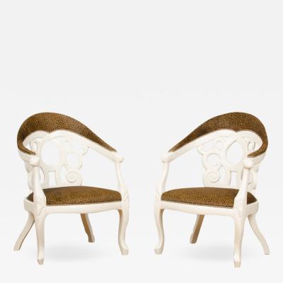 David Barrett A pair of white lacquered armchairs designed by D Barrett circa 1970