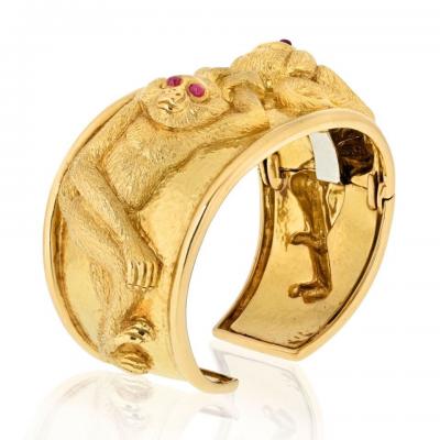 David Webb DAVID WEBB PLATINUM 18K YELLOW GOLD REPOUSSE MONKEY RUBY EYES CUFF BRACELET