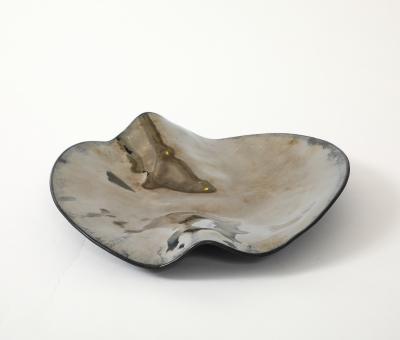 Decorative free form wave platter Made By Aram C