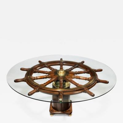 Dining table made from a 19th Century ships steering wheel