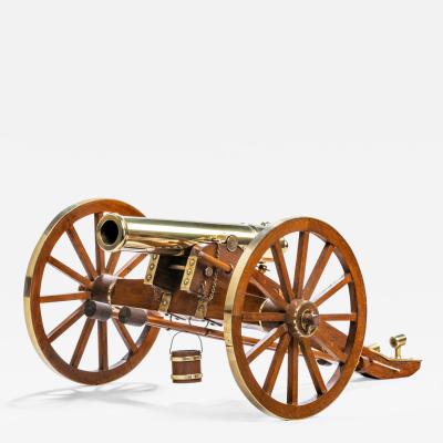 Dockyard built teak and brass field cannon