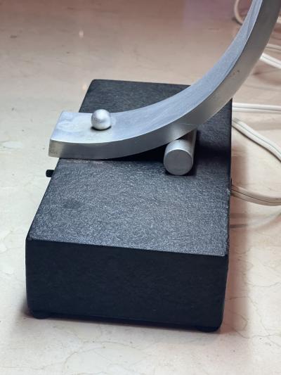 Donald Deskey DONALD DESKEY ALUMINUM BAND AND BLACK BASE DESK LAMP