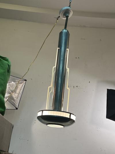 Donald Deskey EXCEPTIONAL PAIR OF MODERNIST ART DECO CHROME AND GLASS SKYSCRAPER CHANDELIERS