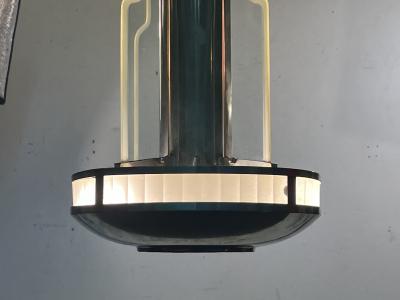 Donald Deskey EXCEPTIONAL PAIR OF MODERNIST ART DECO CHROME AND GLASS SKYSCRAPER CHANDELIERS