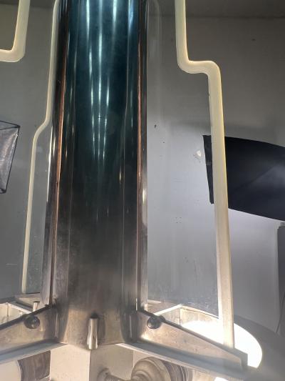 Donald Deskey EXCEPTIONAL PAIR OF MODERNIST ART DECO CHROME AND GLASS SKYSCRAPER CHANDELIERS