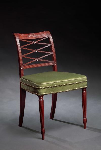 Duncan Phyfe Set of Nine Federal Carved Mahogany Dining Chairs including an Armchair