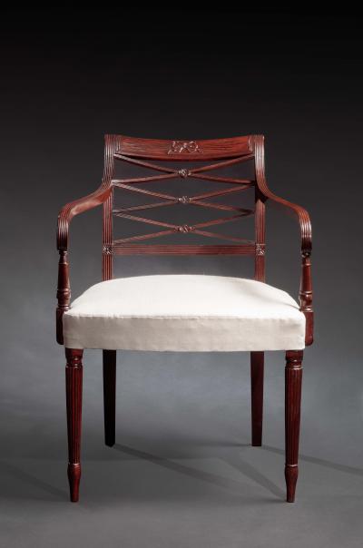 Duncan Phyfe Set of Nine Federal Carved Mahogany Dining Chairs including an Armchair