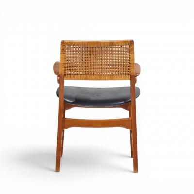 E Knudsen for Jensen Lykkegaard Model 48 Danish Teak Cane Dining Arm Chair