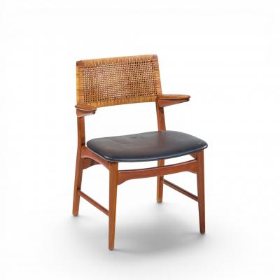 E Knudsen for Jensen Lykkegaard Model 48 Danish Teak Cane Dining Arm Chair