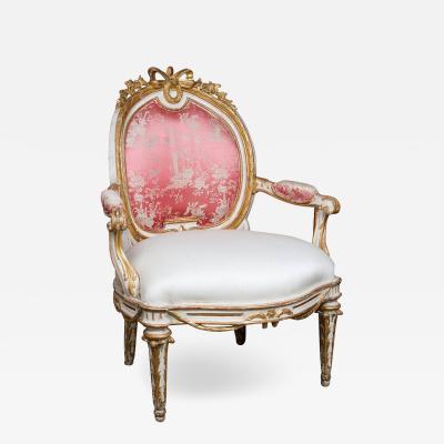 ELEGANT GILDED AND WHITE PAINTED UPHOLSTERED ITALIAN LOUIS XVI STYLE ARMCHAIR