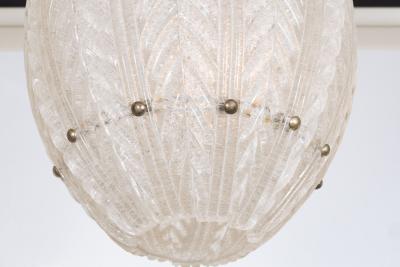 ELLIPTICAL MOLDED GLASS AND BRASS CHANDELIER