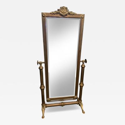 EXCEPTIONAL ANTIQUE BRASS DRESSING MIRROR WITH HAND ACCENTS