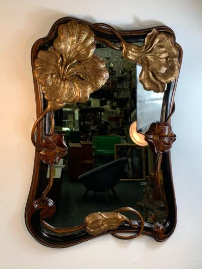 EXCEPTIONAL ART NOUVEAU CARVED AND GILT FLOWER MIRROR