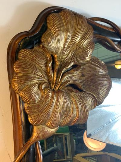 EXCEPTIONAL ART NOUVEAU CARVED AND GILT FLOWER MIRROR