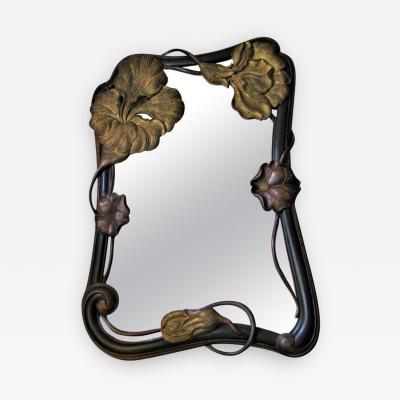 EXCEPTIONAL ART NOUVEAU CARVED AND GILT FLOWER MIRROR