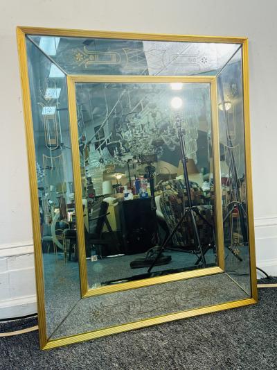 EXCEPTIONAL FRENCH MODERNE BRASS MIRROR WITH GOLD DESIGN