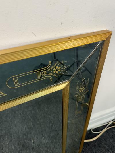 EXCEPTIONAL FRENCH MODERNE BRASS MIRROR WITH GOLD DESIGN