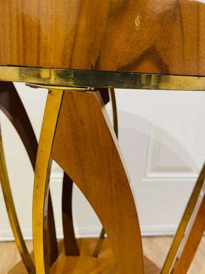 EXCEPTIONAL ITALIAN MID CENTURY LACQUERED WOOD AND BRASS TABLE