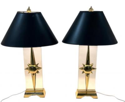 EXCEPTIONAL MODERNIST SCULPTED BRASS SUNBURST LUCITE LAMPS WITH FLAME FINIALS