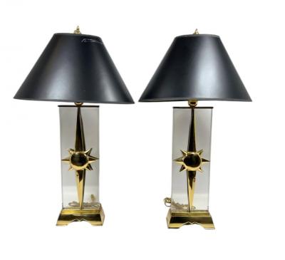 EXCEPTIONAL MODERNIST SCULPTED BRASS SUNBURST LUCITE LAMPS WITH FLAME FINIALS