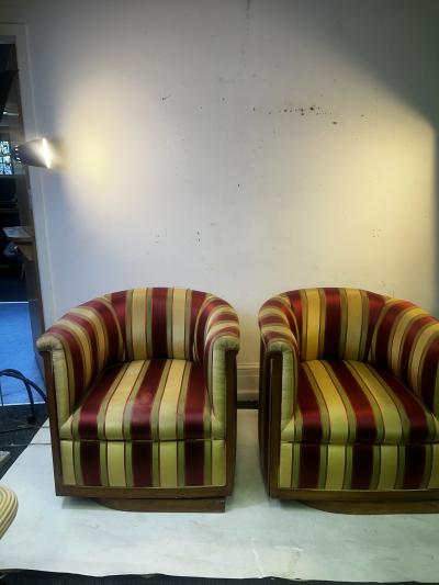 EXCEPTIONAL PAIR OF MAHOGANY FRAMED ART DECO SWIVEL CLUB CHAIRS