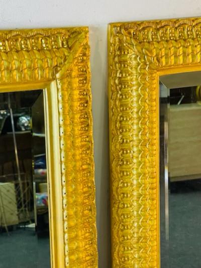 EXCEPTIONAL PAIR OF RENAISSANCE STYLE GOLD LEAF CARVED WOOD MIRRORS