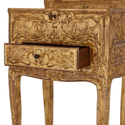 Early 18th Century French R gence period carved giltwood table with mirror
