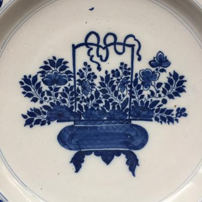 Early 18th century Dutch Delft plate with flower basket design