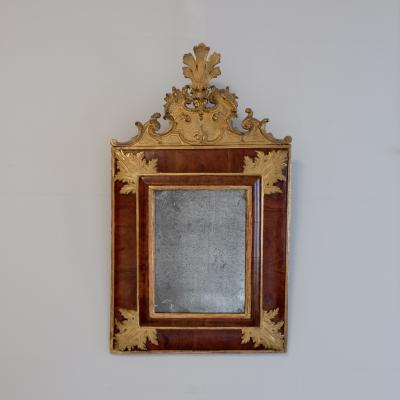 Early 18th century walnut and giltwood cushion mirror France