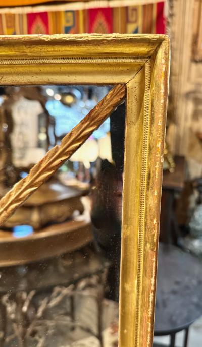 Early 19th Century English Segmented Gilt Carved Wood Mantle Mirror
